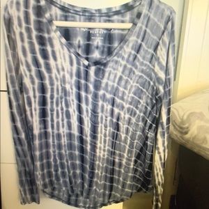 Large blue and white long sleeve shirt.